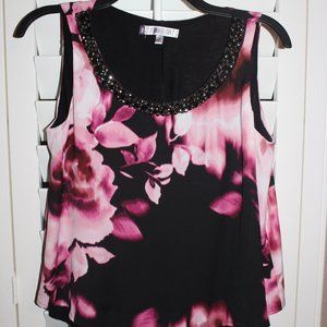 Beautiful jeweled neck, sleeveless blouse